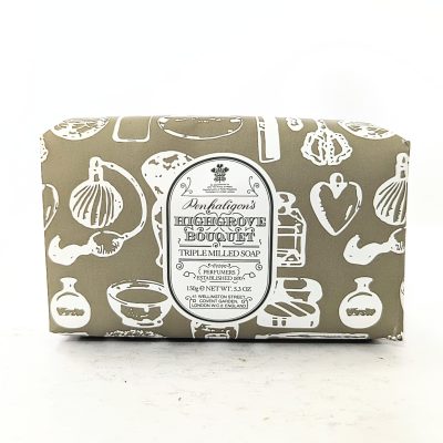 A rectangular bar of Penhaligon's Highgrove Bouquet triple milled soap, wrapped in beige paper with white illustrations and a central label displaying product details.