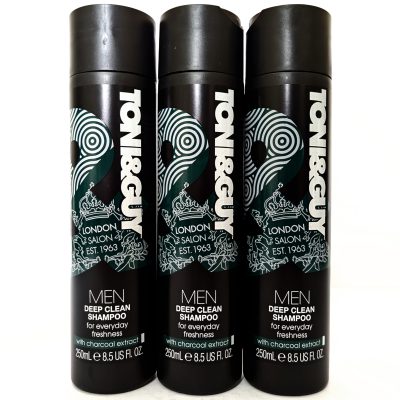 Three bottles of Toni & Guy Men Deep Clean Shampoo with charcoal extract, each containing 250ml, are arranged side by side against a white background.