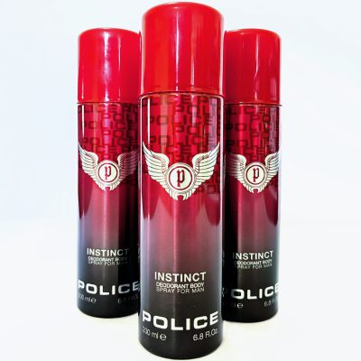 Three 200ml cans of 3x Police Instinct Deodorant Spray for Men stand upright and closely grouped against a white background.
