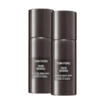 Two identical black cylindrical bottles labeled "2x Tom Ford Private Blend Oud Wood Body Spray 150ml" stand side by side against a white background.