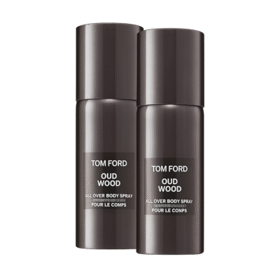 Two identical black cylindrical bottles labeled "2x Tom Ford Private Blend Oud Wood Body Spray 150ml" stand side by side against a white background.