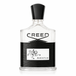 A clear glass bottle of Creed Aventus Eau de Parfum EDP 100ml Spray for Men featuring a black cap, a black textured band, and a white label adorned with an illustration of a horseback rider.
