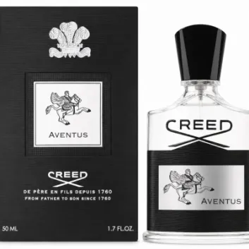 A Creed Aventus Eau de Parfum EDP 50ml Spray for Men bottle and its black box are displayed side by side, each adorned with a silver label featuring a horse and rider illustration.