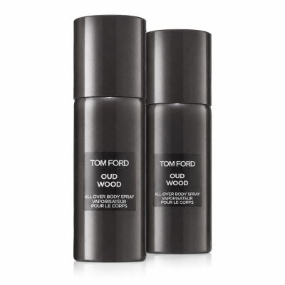 Two black cylindrical spray bottles of "Tom Ford Private Blend Oud Wood Body Spray 150ml" stand side by side on a white background.
