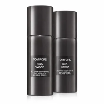 Two black cylindrical spray bottles of "Tom Ford Private Blend Oud Wood Body Spray 150ml" stand side by side on a white background.