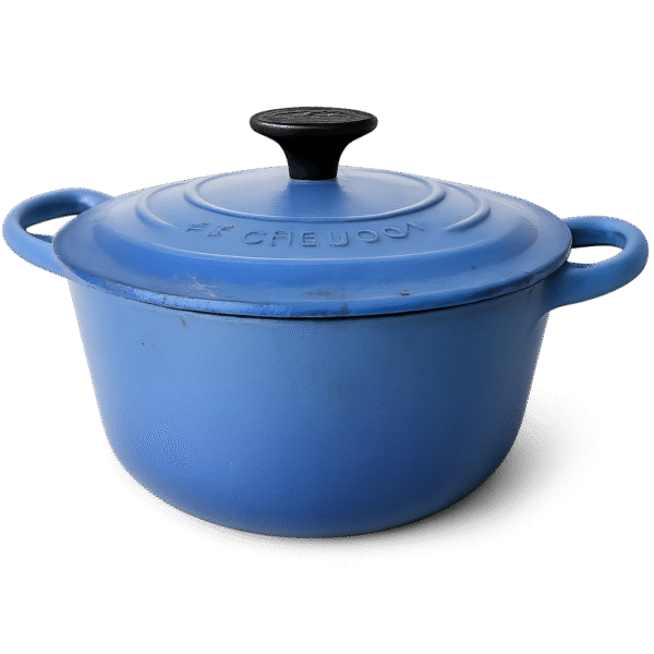 A blue, round Le Creuset cast iron Dutch oven with handles on both sides and a black knob on the lid, shown against a plain white background.