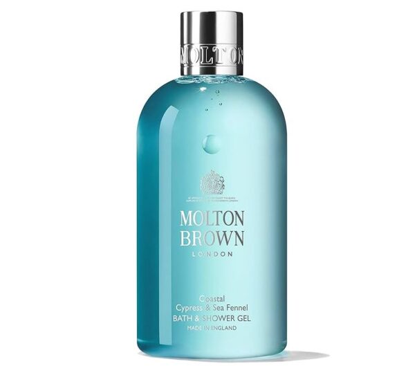 Two light blue bottles of Molton Brown Coastal Cypress & Sea Fennel Bath and Shower Gel (300ml each, unisex), featuring silver caps and white text.