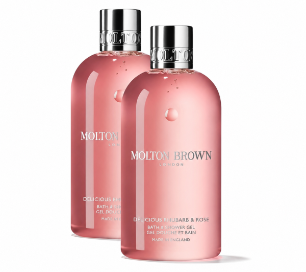 Two bottles of Molton Brown Delicious Rhubarb & Rose Bath & Shower Gel 300ml Unisex, featuring pink gel and silver caps with white text labels, are positioned side by side against a white background.