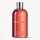 Two bottles of Molton Brown Heavenly Gingerlily Bath & Shower Gel 300ml for women, featuring silver caps, displayed against a white background.