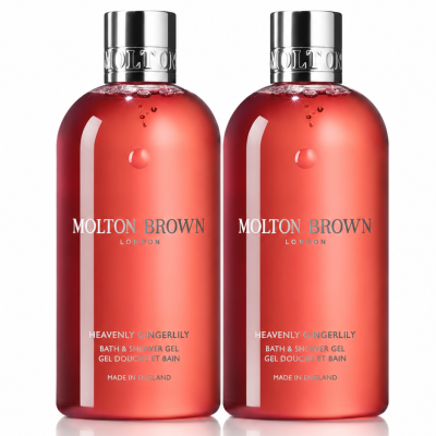 Two bottles of 2x Molton Brown Heavenly Gingerlily Bath & Shower Gel 300ml, Womens, each featuring silver caps and filled with red liquid, are arranged side by side against a white background.
