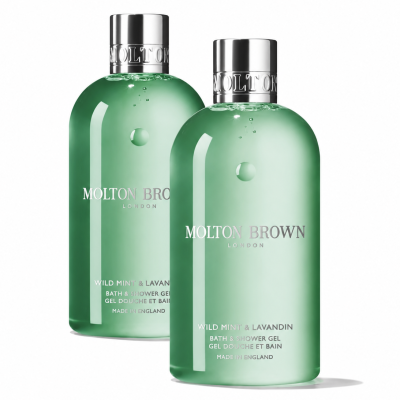 Two bottles of Molton Brown Wild Mint & Lavandin Bath & Shower Gel 300ml (unisex), each with a silver cap, are standing side by side on a white background.