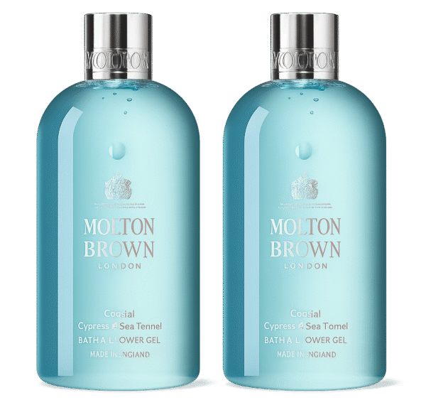 Two bottles of Molton Brown Coastal Cypress & Sea Fennel Bath and Shower Gel (300ml, unisex) with silver caps, clear blue liquid, and white labels stand side by side against a white background.