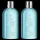 Two bottles of Molton Brown Coastal Cypress & Sea Fennel Bath and Shower Gel (300ml, unisex) with silver caps, clear blue liquid, and white labels stand side by side against a white background.