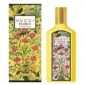 A yellow Gucci Flora Gorgeous Orchid EDP 100ml bottle and its matching floral-patterned box are displayed side by side.
