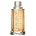 A 50ml spray bottle of Hugo Boss The Scent Pure Accord For Him EDT, with clear glass, a silver cap, gold liquid inside, and "BOSS" branding on the front.