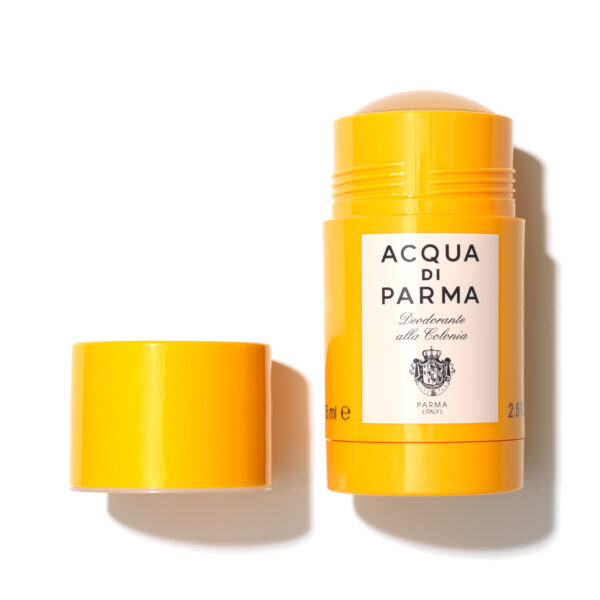 Three open Acqua di Parma Colonia Deodorant Sticks (Unisex, 75ml) with their yellow caps placed beside them on a white background.