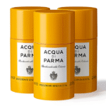 Three Acqua di Parma Colonia Deodorant Sticks, unisex 75ml each, with yellow cylindrical packaging and white labels, are arranged on a white background.