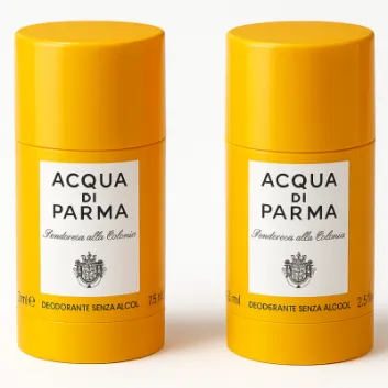 Three yellow cylindrical Acqua di Parma Colonia Deodorant Sticks, unisex 75ml each, with white labels are standing side by side on a white background.