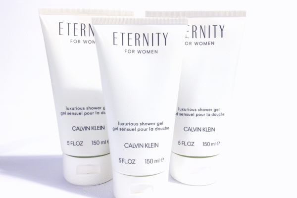 Three 150ml tubes of Calvin Klein Eternity for Women Shower Gel are displayed upright against a white background. Three 150ml tubes of Calvin Klein Eternity for Women Shower Gel are displayed upright against a white background.