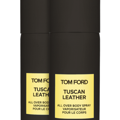 Two black cylindrical bottles of Tom Ford Tuscan Leather Unisex Body Spray 150ml with yellow labels.