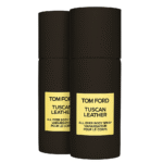 Two black cylindrical bottles of Tom Ford Tuscan Leather Unisex Body Spray 150ml with yellow labels are displayed against a white background.
