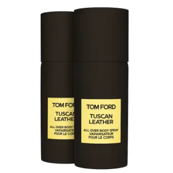 Two black cylindrical bottles of Tom Ford Tuscan Leather Unisex Body Spray 150ml with yellow labels are displayed against a white background.