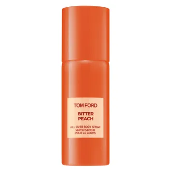 Two orange spray bottles labeled "Tom Ford Bitter Peach All Over Body Spray" stand upright against a plain white background.