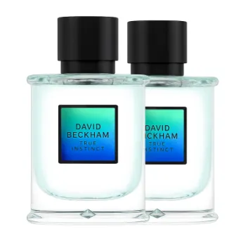 Two bottles of David Beckham True Instinct Eau de Parfum 75ml Spray, featuring clear glass, black caps, and blue-green gradient labels, are displayed side by side on a plain background.