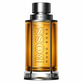 A 50ml bottle of Hugo Boss The Scent EDT for Men, featuring amber liquid inside a clear, cylindrical glass bottle with metallic cap and accents.