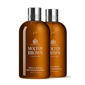 Two 300ml bottles of Molton Brown Tobacco Absolute Bath and Shower Gel are placed side by side against a white background.