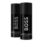 Three black cans of Hugo Boss Bottled Beyond Deodorant Spray for men (150 ml each) are arranged side by side against a plain background.