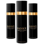 Three cans of Carolina Herrera Bad Boy Deodorant Spray for Men, 100ml each, are arranged side by side against a white background.