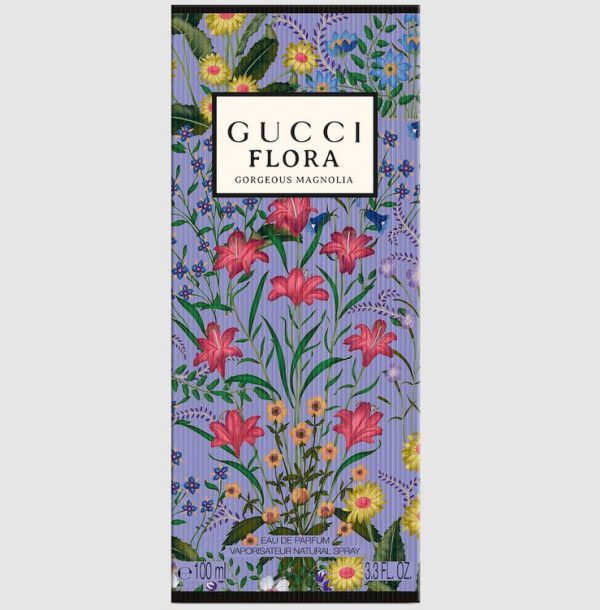 A rectangular box of Gucci Flora Gorgeous Magnolia Eau de Parfum for Women, 100ml Spray, featuring colorful flowers on a purple background.