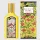 A yellow bottle of Gucci Flora Gorgeous Orchid EDP 50ml Spray for women is displayed beside its matching floral-patterned box.
