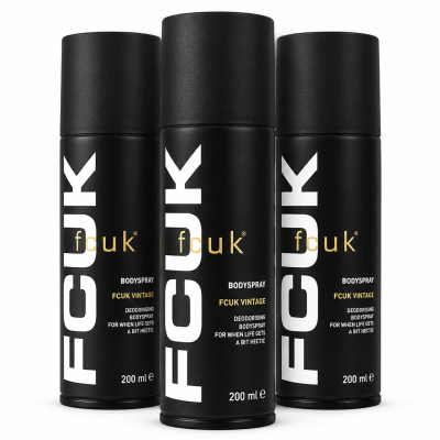 Three 200ml cans of Fcuk Vintage Deodorising Body Spray for Men are arranged in a row against a white background. The black cans display bold white and gold text on their labels.
