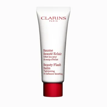 A 50ml white tube of Clarins Beauty Flash Balm with a red cap and text, designed to tighten skin and boost radiance.