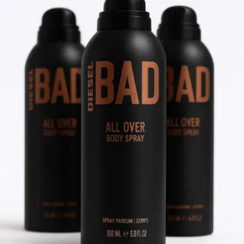 Three black cans of Diesel Bad Body Spray for Men, 200ml each, are shown with copper-colored lettering.
