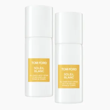 Two upright white bottles of 2x Tom Ford Soleil Blanc Body Spray (Unisex, 150ml) with yellow labels, displayed side by side on a white background.