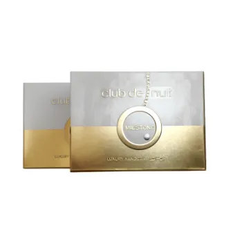 Two rectangular perfume boxes labeled "club de nuit Milstone," with a metallic gold and silver design, partially overlapping each other on a white background.