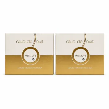 Two bars of Armaf Club De Nuit Milestone unisex soap (130g each), featuring a white and gold design with a chain motif on the front.