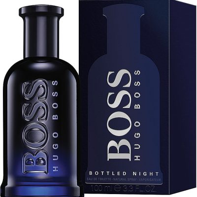 A dark blue bottle of Hugo Boss Boss Bottled Night EDT Spray for Men, 100ml, appears beside its matching box, both featuring the brand name in bold silver letters.