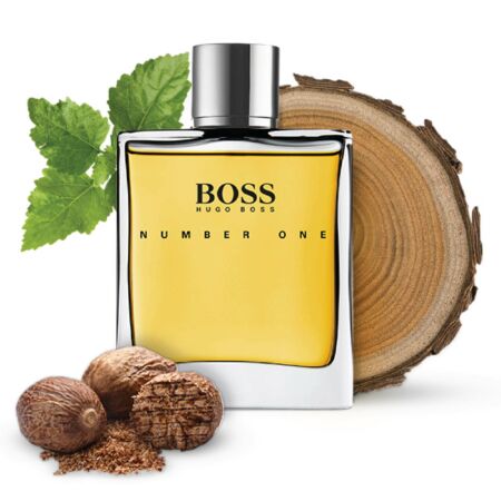 Hugo Boss Boss Number One EDT Spray for Men, 100ml, is displayed surrounded by wood, nutmeg, and green leaves.