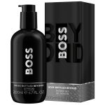 A 200ml bottle of Hugo Boss Boss Bottled Beyond Shower Gel for Men with a pump is displayed beside its matching black box packaging.
