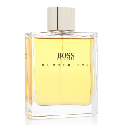 A 100ml rectangular glass bottle of Hugo Boss Boss Number One EDT Spray for Men, filled with yellowish liquid and topped with a gold cap, displayed on a white background.