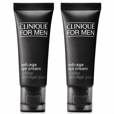 Three identical black tubes of Clinique for Men Age Defense for Eyes 15ml are standing upright on a white background.