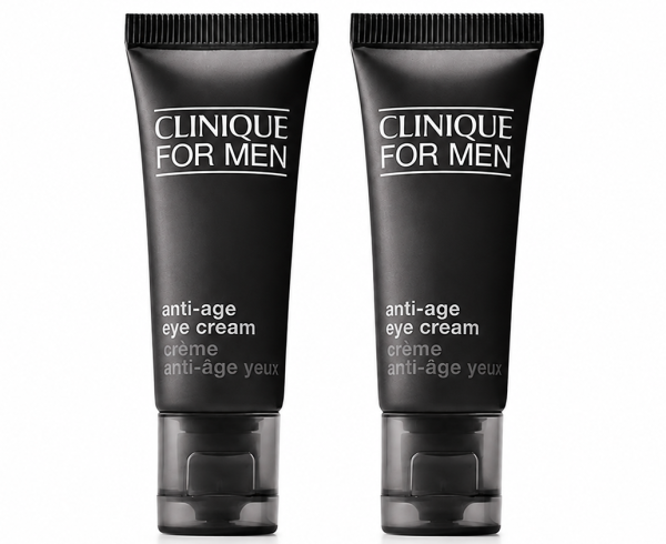 Three identical black tubes of Clinique for Men Age Defense for Eyes 15ml are standing upright on a white background.
