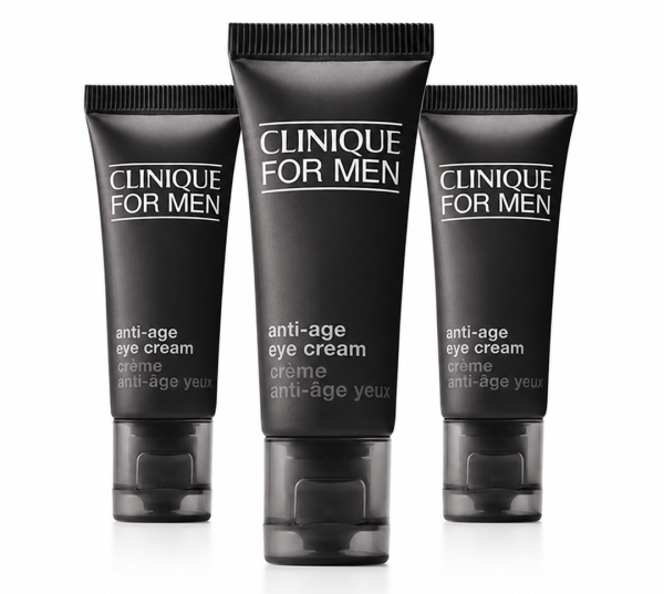 Three tubes of Clinique Clinique for Men Age Defense For Eyes 15ml are standing upright on a white background.