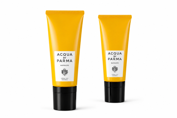 Two yellow tubes of Acqua di Parma Barbiere Multi Action Face Cream 50ml stand upright against a white background.