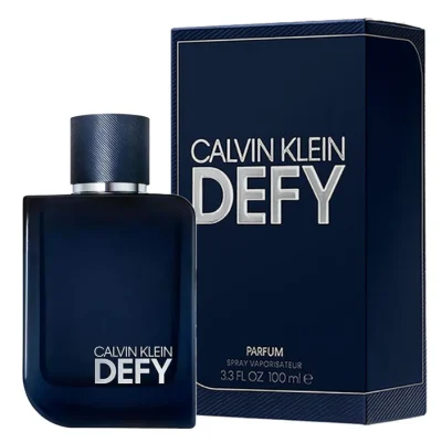 A 100ml bottle and box of Calvin Klein Defy Parfum Spray, featuring dark blue packaging with bold white branding.
