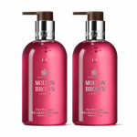 Two 300ml bottles of Molton Brown Fiery Pink Pepper Hand Wash (Unisex) with pump dispensers, displayed against a white background.